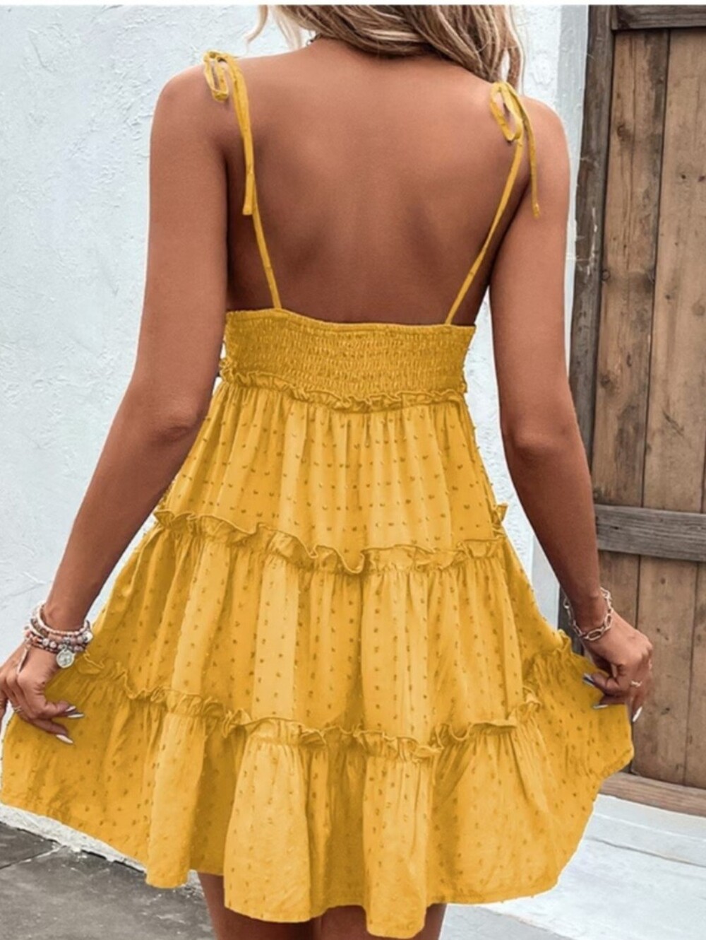 Umgee tiered babydoll mini dress in a vibrant mustard yellow/goldenrod shade.